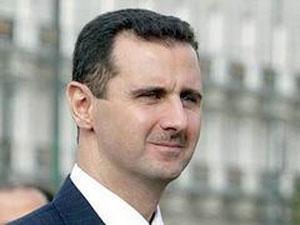 Б. Асад.