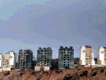 Строительство израильского поселения на Западном берегу. Фото Reuters.