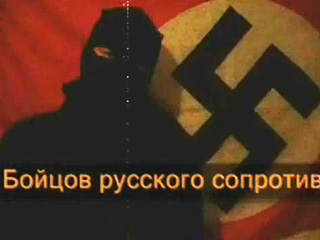 В ролике человек в маске приветствует «собратьев по идее» и призывает к дальнейшему террору