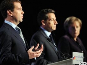 Президенты России и Франции и канцлер Германии:  Дмитрий Медведев, Николя Саркози и Ангела Меркель