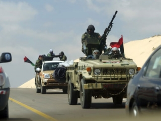 Ливийские повстанцы требуют отставки Каддафи до вступления в переговорный процесс