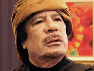 Каддафи инвестировал деньги Ливии в банки Швейцарии
