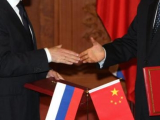 Путин решил сыграть в паре с Китаем против пары США и ЕС