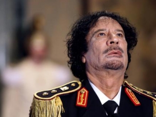 Новые власти Ливии обещают привлечь к ответственности виновных в смерти Каддафи