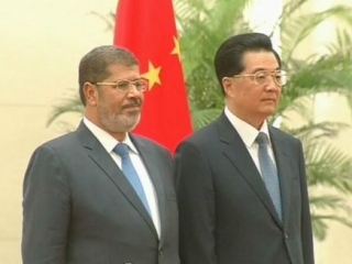 Египетский лидер со своим китайским коллегой Ху Цзиньтао