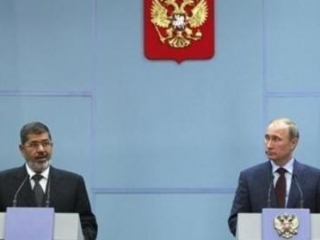 Владимир Путин и Мухаммед Мурси на брифинге в Сочи