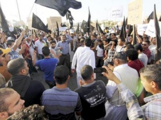 Сепаратисты с флагами Киренаики в городе Бенгази