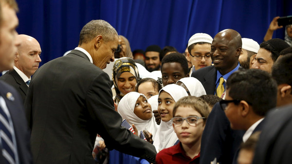 U.S. President Barack Obama greets students after his remarks at the Islamic Society of Baltimore mosque in Catonsville, Maryland February 3, 2016.  REUTERS/Jonathan Ernst