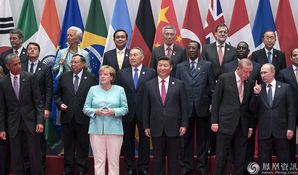 Summit leaders pose for a family photo at the G-20 summit hosted by China's President Xi Jinping center, in Hangzhou, China. Among the leaders pictured are U.S. President Barack Obama, left, German Chancellor Angela Merkel, sixth from left, Thai Prime Minister  Prayuth Chan-ocha, seventh from left, Singapore Prime Minister Lee Hsien Loong, top center, Russian President Vladimir Putin, second right, Turkey's President Recep Tayyip Erdogan. (Stephen Crowely/Pool Photo via AP)