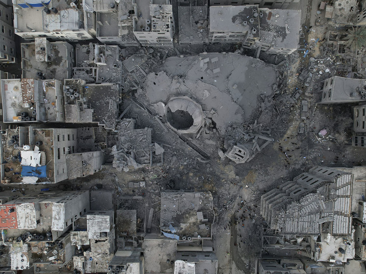 Жилой квартал в Газе после израильского удара
